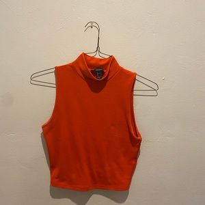 crop top that’s orangish red, only wore 2 times